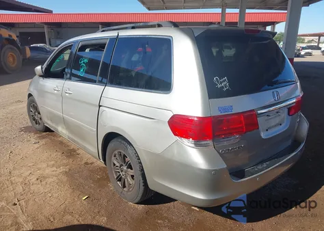 2009 Honda Odyssey Touring z USA, uszkodzony, nr VIN 5FNRL38819B021352